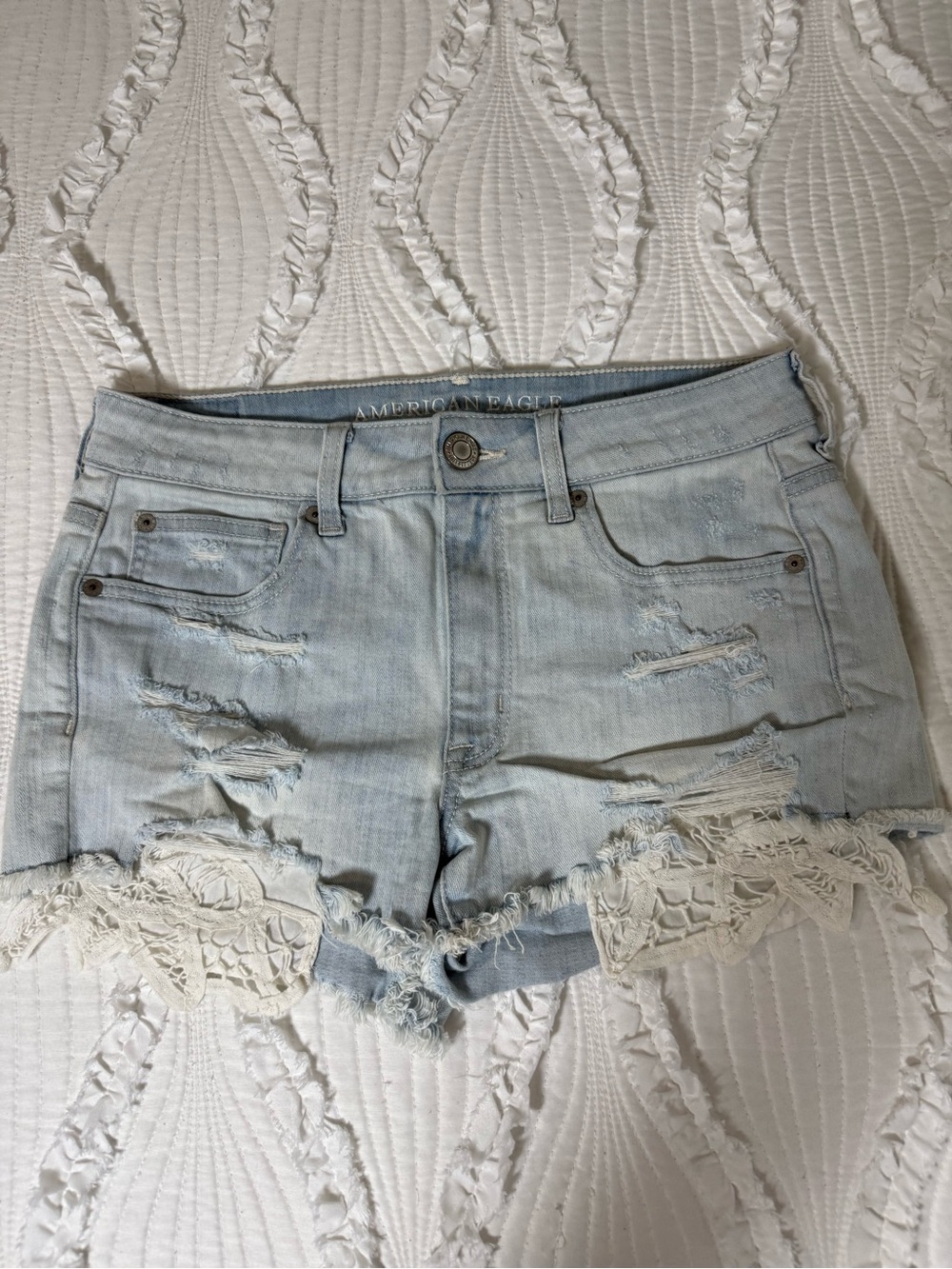 American Eagle Outfitters Light Wash Distressed Denim Shorts with Lace Trim